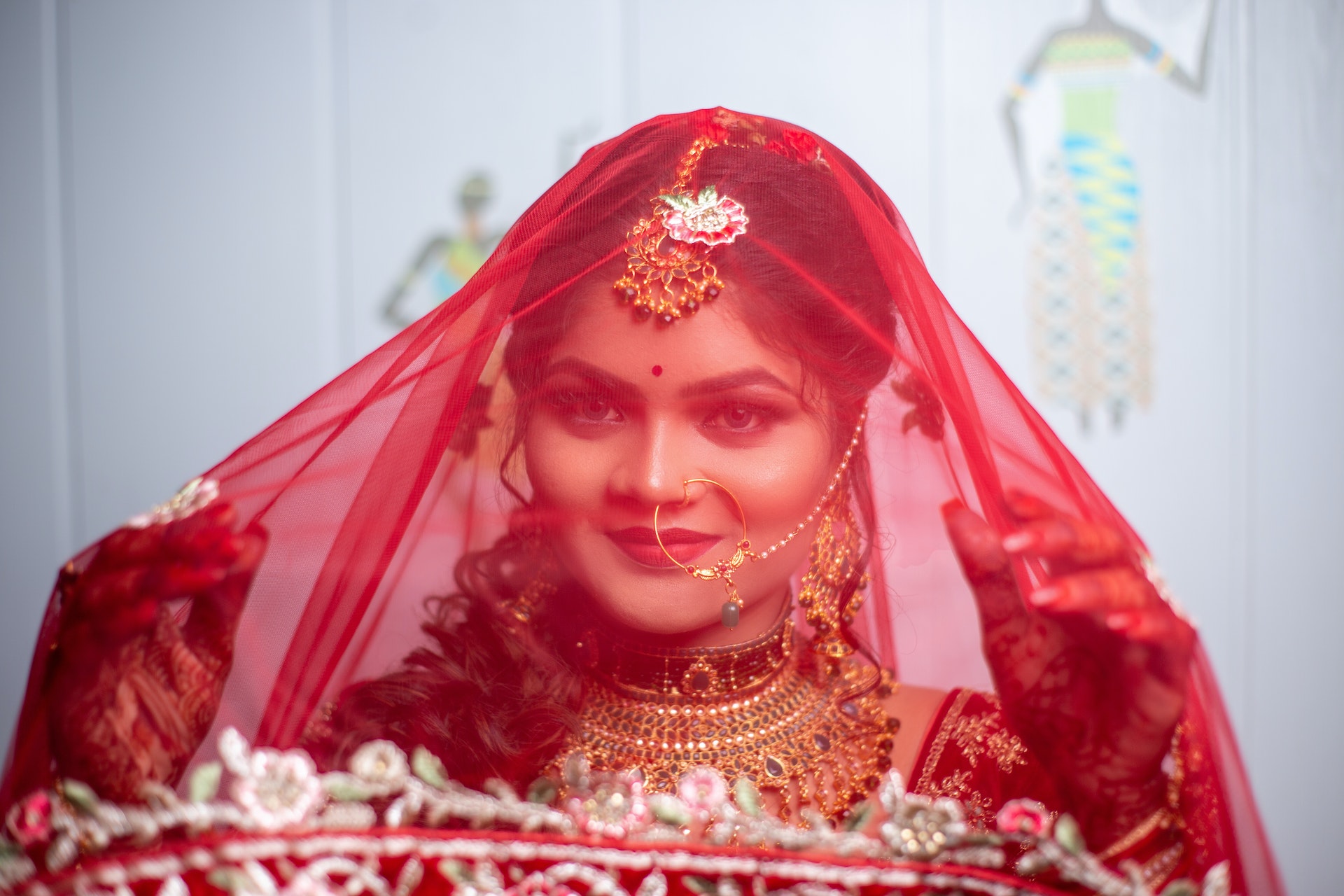 Photo by Satish Photos httpswww.pexels.comphotoportrait-of-a-bride-with-a-red-veil-14239189 Photo by Satish Photos httpswww.pexels.comphotoportrait-of-a-bride-with-a-red-veil-14239189